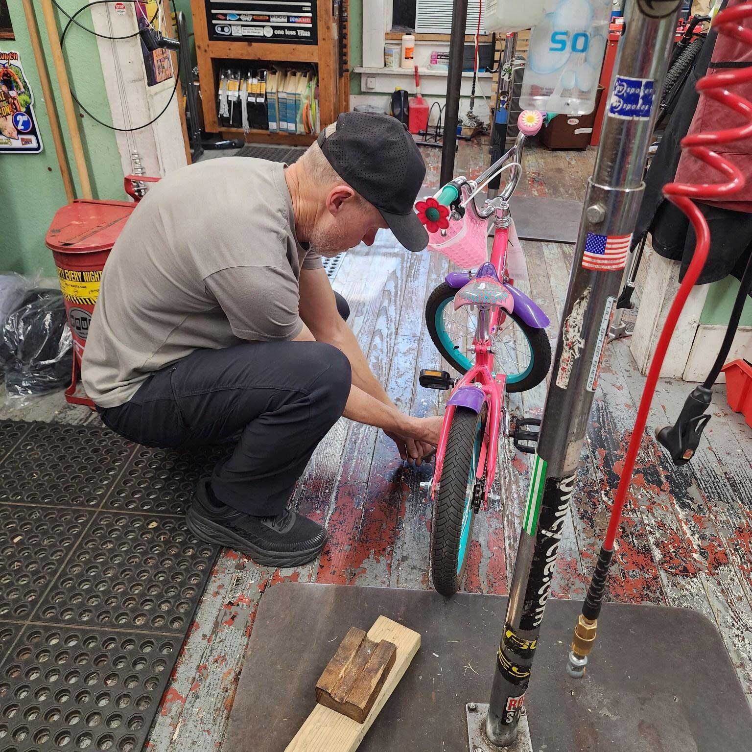 repairing child's bike
